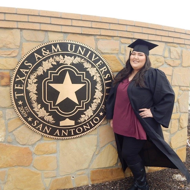 Selena in her cap and gown